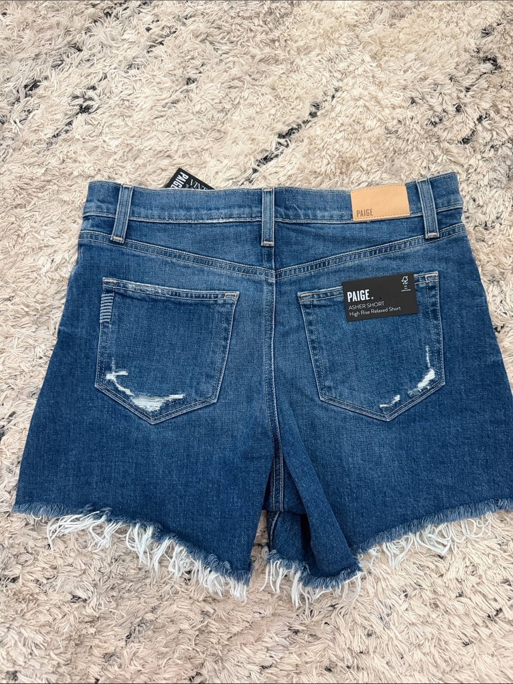 PAIGE Medium Wash Frayed Hem Denim Shorts - Picture 6 of 6